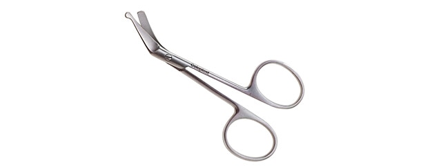 Curved scissors for cutting ostomy barriers