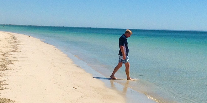 Ken op het strand