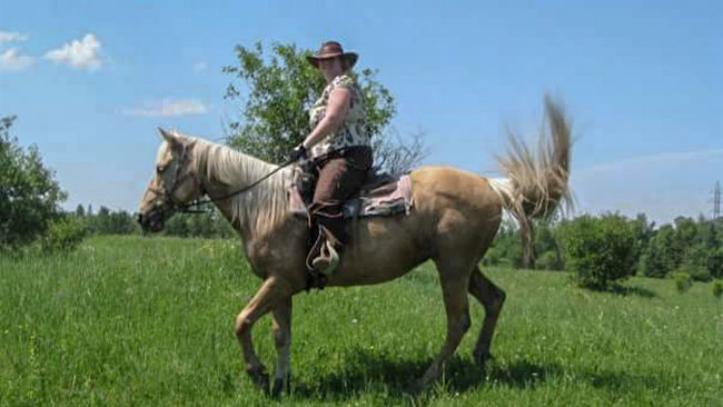 Andria riding the horse