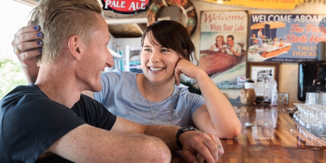 Photo of Sarah and her partner. Transanal irrigation involves introducing body-temperature water into the colon via the rectum with a soft and flexible catheter.