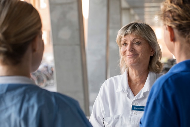 Photo of Anna, a healthcare professional. Peristeen Light is a low-volume TAI system; Peristeen Plus is a high-volume TAI system.